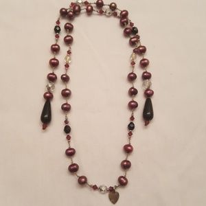 Purple bead necklace with heart charm